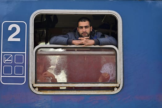 October 6,2015; Hegyeshalom in Hungary. Group of refugees leaving Hungary. They came to Hegyeshalom by train and then they leaving Hungary and go to Austria and then to Germany. Many of them escapes from home because of civil war. 