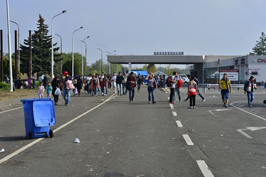 October 6,2015; Hegyeshalom in Hungary. Group of refugees leaving Hungary. They came to Hegyeshalom by train and then they leaving Hungary and go to Austria and then to Germany. Many of them escapes from home because of civil war. 