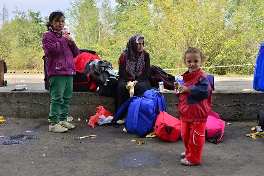 October 6,2015; Hegyeshalom in Hungary. Group of refugees leaving Hungary. They came to Hegyeshalom by train and then they leaving Hungary and go to Austria and then to Germany. Many of them escapes from home because of civil war. 