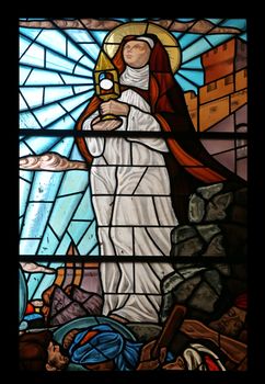 Saint Clare of Assisi stained glass window in the Church of the Holy Sacrament in Portoferraio, Elba, Italy on May 03, 2014 Portoferraio, Italy