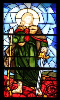 Saint Michael stained glass window in the Church of the Holy Sacrament in Portoferraio, Elba, Italy on May 03, 2014 Portoferraio, Italy