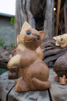 Beautiful wooden carved turtles , cats, birds .