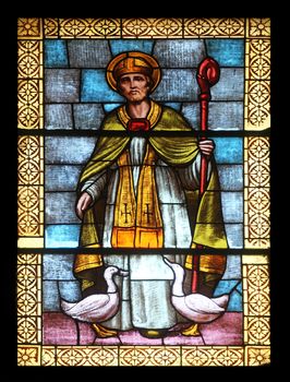 Saint Martin, stained glass window in the church of St. James the Greater in Porto Azzurro, Elba, Italy