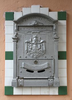 Beautiful old mailbox hanging on the wall