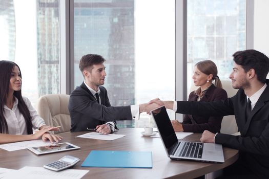 Business people working together at a meeting in modern office