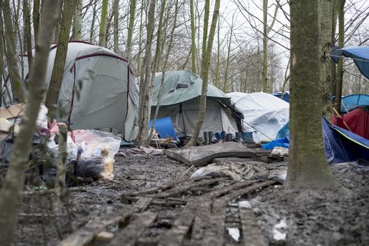 FRANCE, Grande-Synthe: Tents are seen in the mud in the camp in Grande-Synthe, northern France on January 29, 2016.