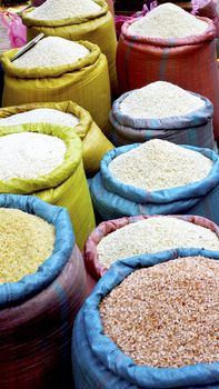 Rice in colorful sack at fresh local market  in Luang Prabang, Laos