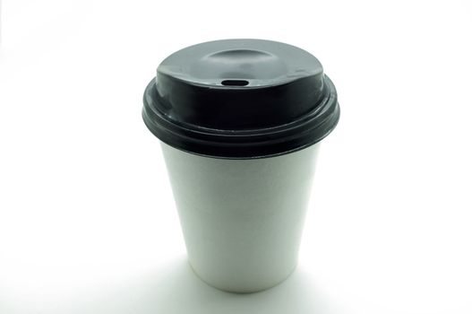 White paper coffee cup with black plastic lid