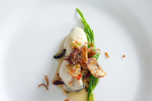 Fresh raw oyster with spicy sauce, thai style seafood