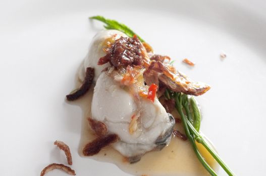 Fresh raw oyster with spicy sauce, thai style seafood