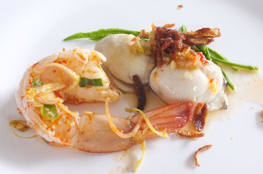 Fresh raw oyster and shrimp with spicy sauce, thai style seafood