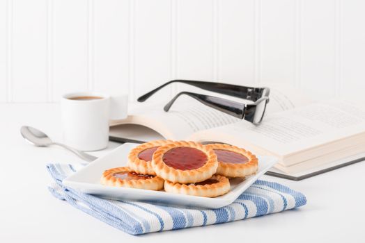 Plate of cookies and coffee to portray the concept of taking a break.