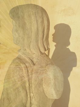 Statue of a pilgrim outside of the monastery in Vadstena Sweden.