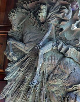 Relief on the door of the church of St. Martin in Portofino, Italy