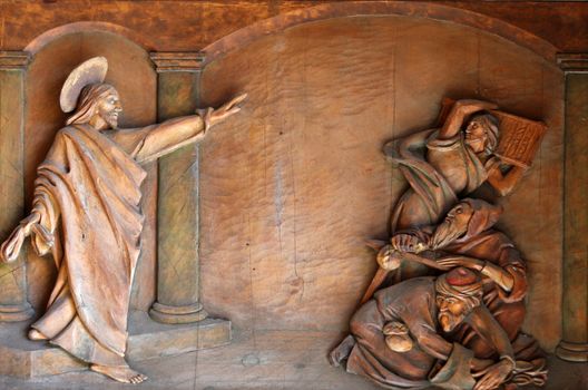 Relief on the door of the church of St. Martin in Portofino, Italy