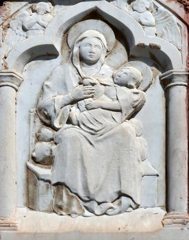 Virgin Mary with Baby Jesus, relief at home in Portofino, Italy