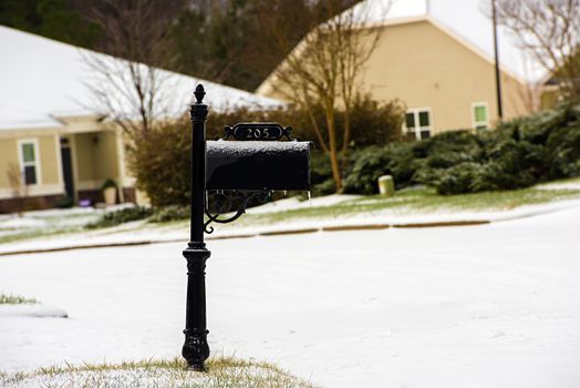 A mailbox covered with fresh white snow