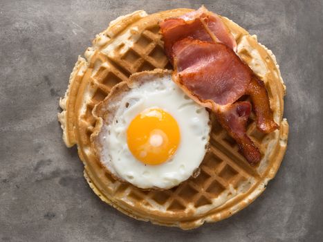 close up of rustic savory bacon and egg waffle