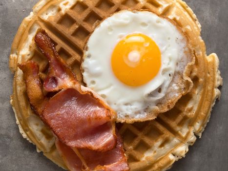 close up of rustic savory bacon and egg waffle