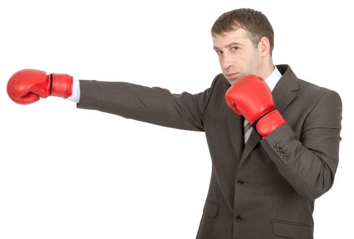 Businessman in red boxing gloves looking at camera isolated on white background