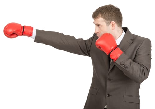 Businessman in red boxing gloves isolated on white background, side view