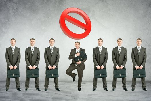 Set of businessmen with big crossed zero on grey wall background