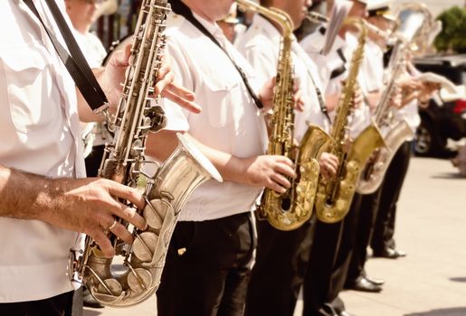 Saxophone players in a military band