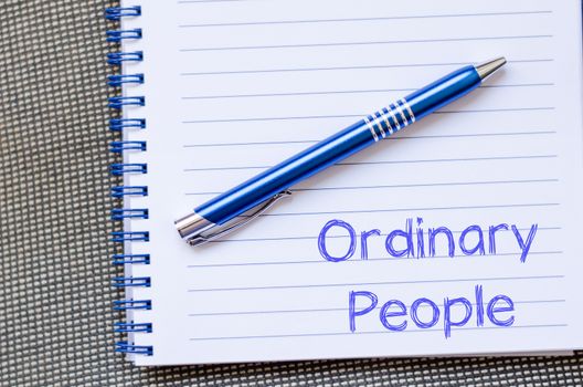 Ordinary people text concept write on notebook with pen
