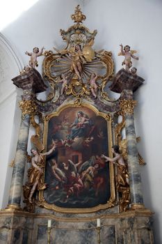 Madonna with child Jesus, altar in the Neumunster Collegiate Church in Wurzburg on July 18, 2013.