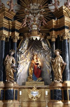 Madonna with child Jesus, altar in the Neumünster Collegiate Church in Wurzburg on July 18, 2013.