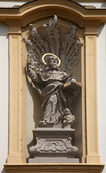 Saint Augustine on the facade of St. Augustine's Church in Wurzburg