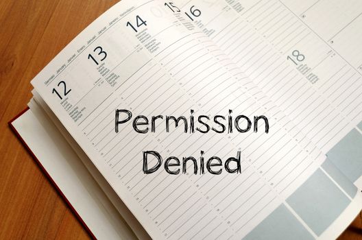 Permission denied text concept write on notebook with pen