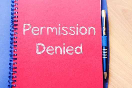 Permission denied text concept write on notebook with pen