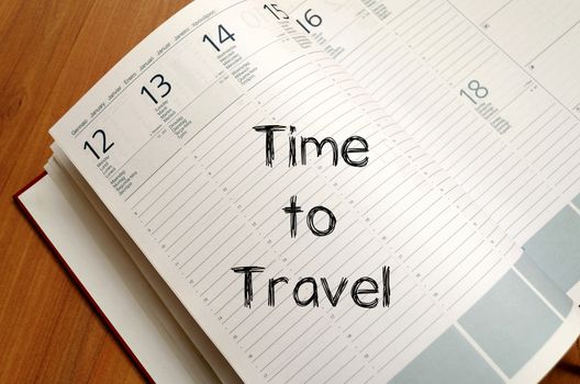 Time to travel text concept write on notebook with pen