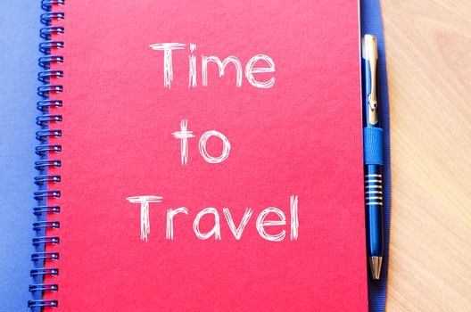 Time to travel text concept write on notebook with pen