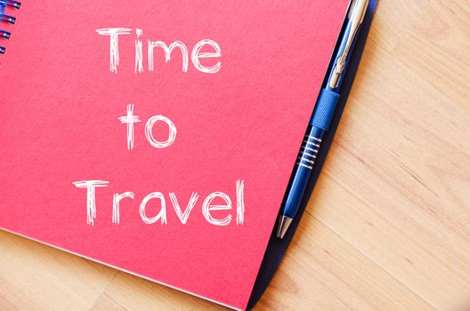 Time to travel text concept write on notebook with pen