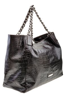 New Black leather womens bag with crocodile texture isolated on white background.