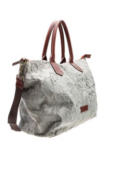 New grey patterned womens bag with brown handles isolated on white background.