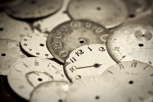 Horizontal top view of a set broken hand watches 
