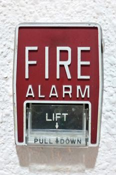 Fire alarm on white wall