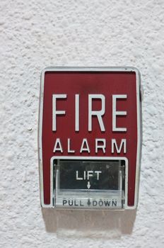Fire alarm on white wall