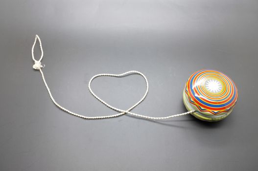 Vintage yoyo with twine rolling in heart shape