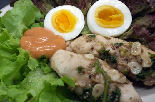 Salad with chicken and egg