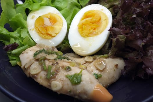 Salad with chicken and egg