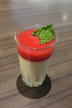 Dessert panna cotta with strawberry sauce