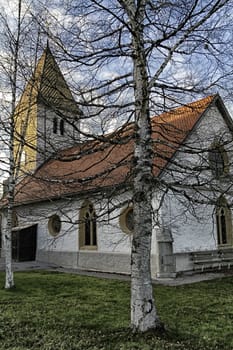 church in Brevine, Switzerland and sky blue and cloud