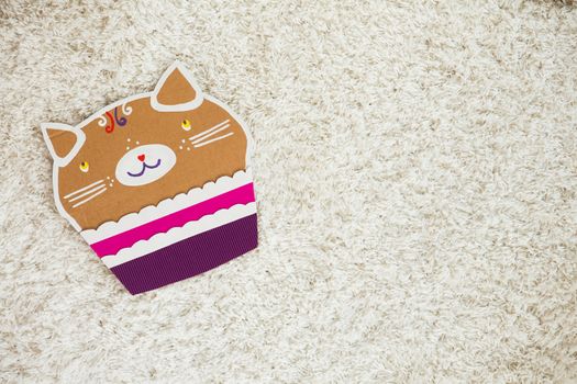 colored cake handmade of cardboar on white background