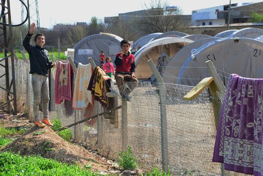 Unnamed  syrian (kurdish) people in refugee camp in Suruc. These people are refugees from Kobane and escaped because of Islamic state attack. March 30, 2015; Suruc, Turkey