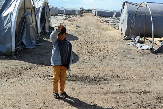 Unnamed  syrian (kurdish) people in refugee camp in Suruc. These people are refugees from Kobane and escaped because of Islamic state attack. March 30, 2015; Suruc, Turkey