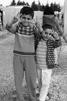 Unnamed  syrian (kurdish) people in refugee camp in Suruc. These people are refugees from Kobane and escaped because of Islamic state attack. April 3, 2015; Suruc, Turkey